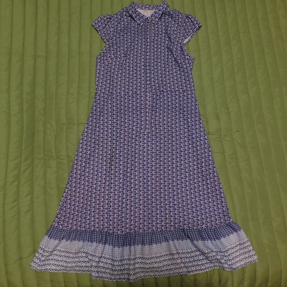 Sleeveless polyester sheath dress with ruffled hem